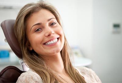 patient smiling during her dental bonding appointment at Park Ridge Smile Center