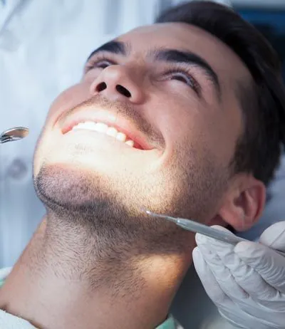 man getting dental checkup at Park Ridge Smile Center