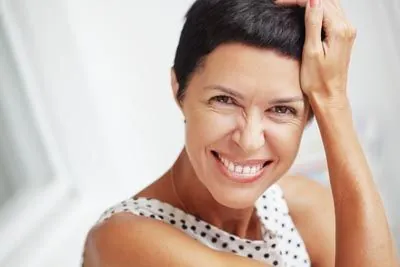woman loving her freshly cleaned smile