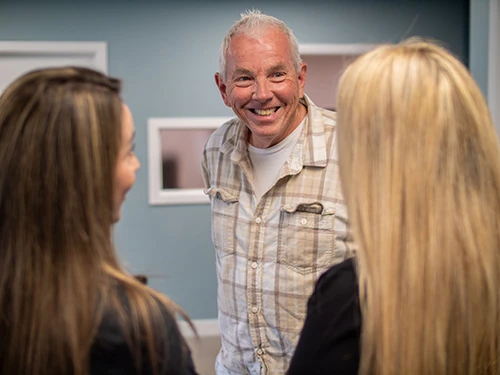 patient smiling after his dental bonding appointment at Park Ridge Smile Center