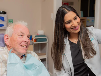 man smiling before his dental procedure